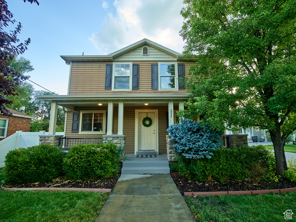 View of front of property featuring covered porch
