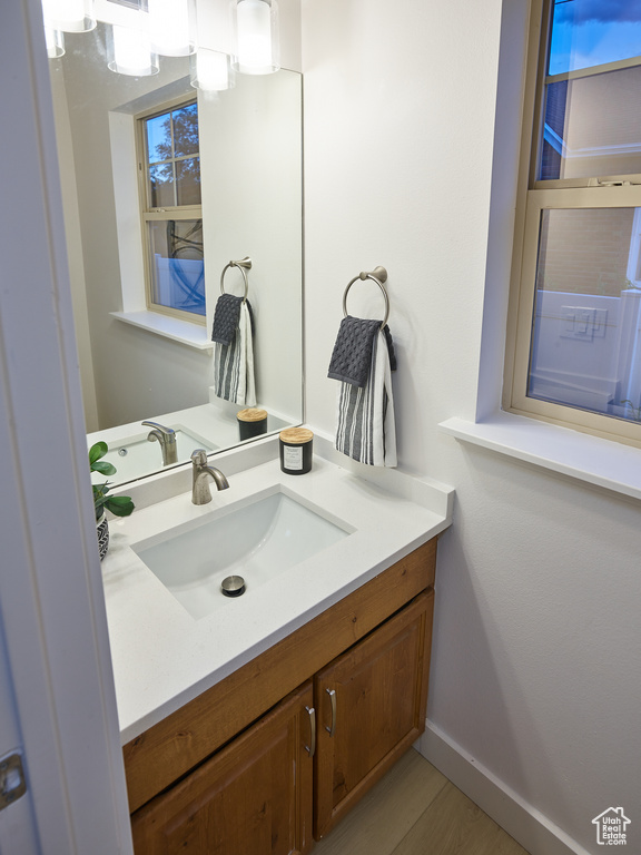 Bathroom with vanity and plenty of natural light