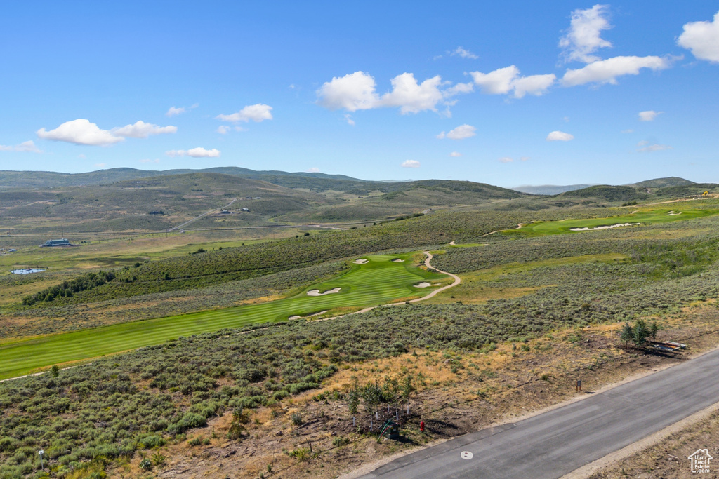 View of mountain background featuring a golf club