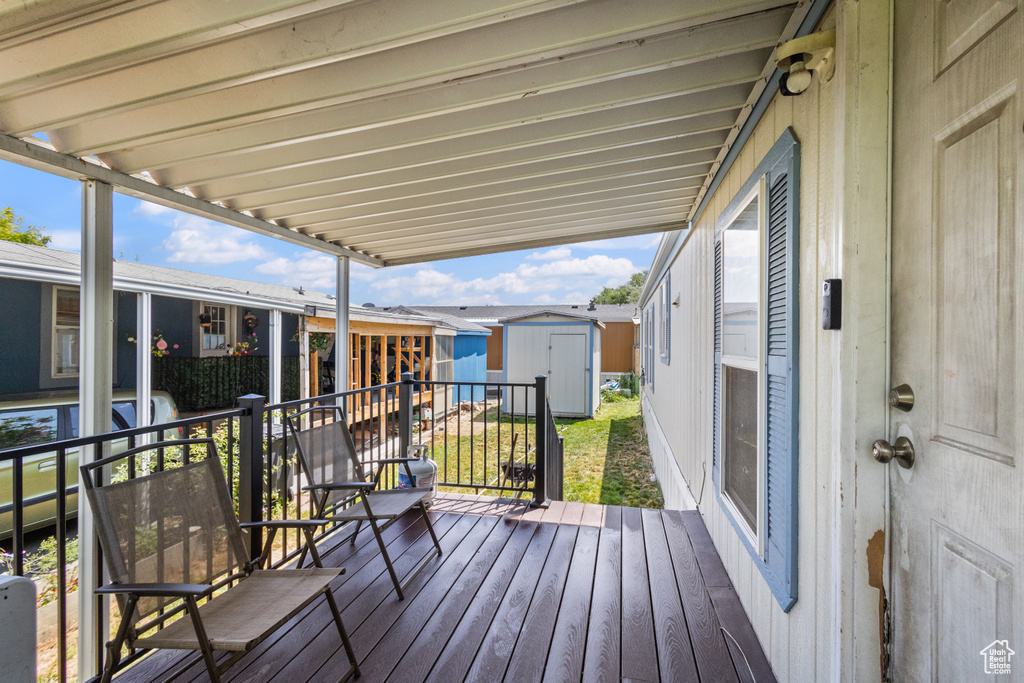 Deck with a storage unit