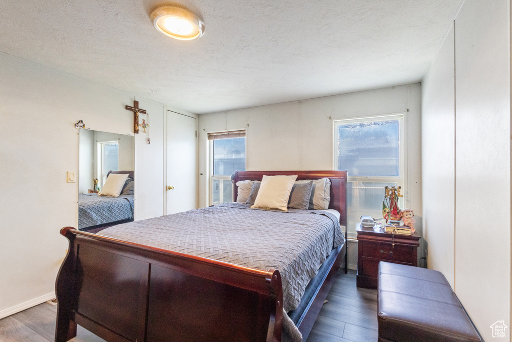 Bedroom featuring wood finished floors