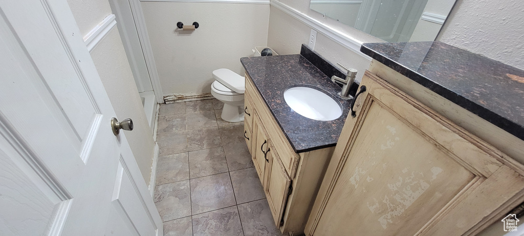 Bathroom with vanity and toilet