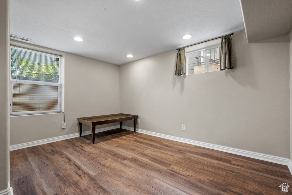 Basement featuring wood finished floors and recessed lighting