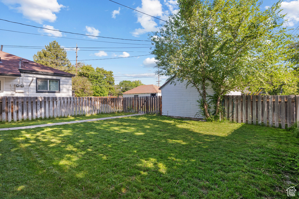 View of fenced backyard