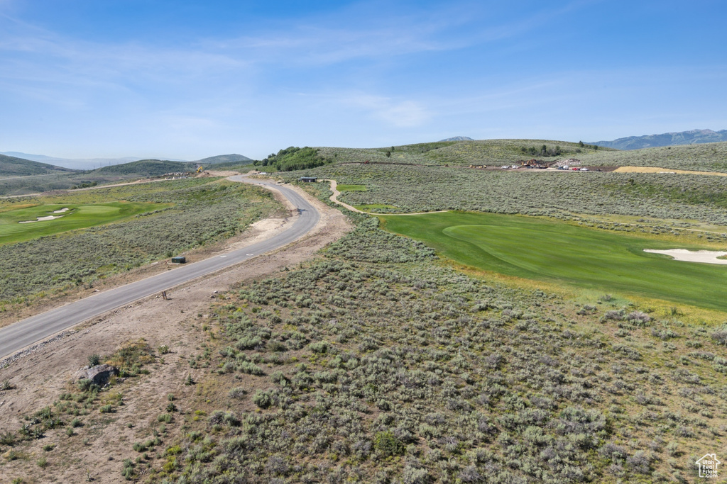 View of home's community featuring a mountain view and golf course view