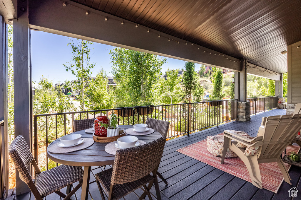 Wooden deck with outdoor dining space