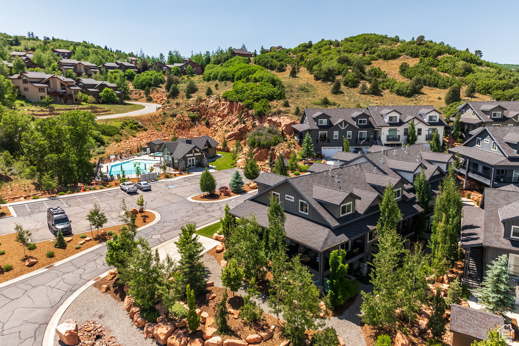Aerial perspective of suburban area featuring a pool area