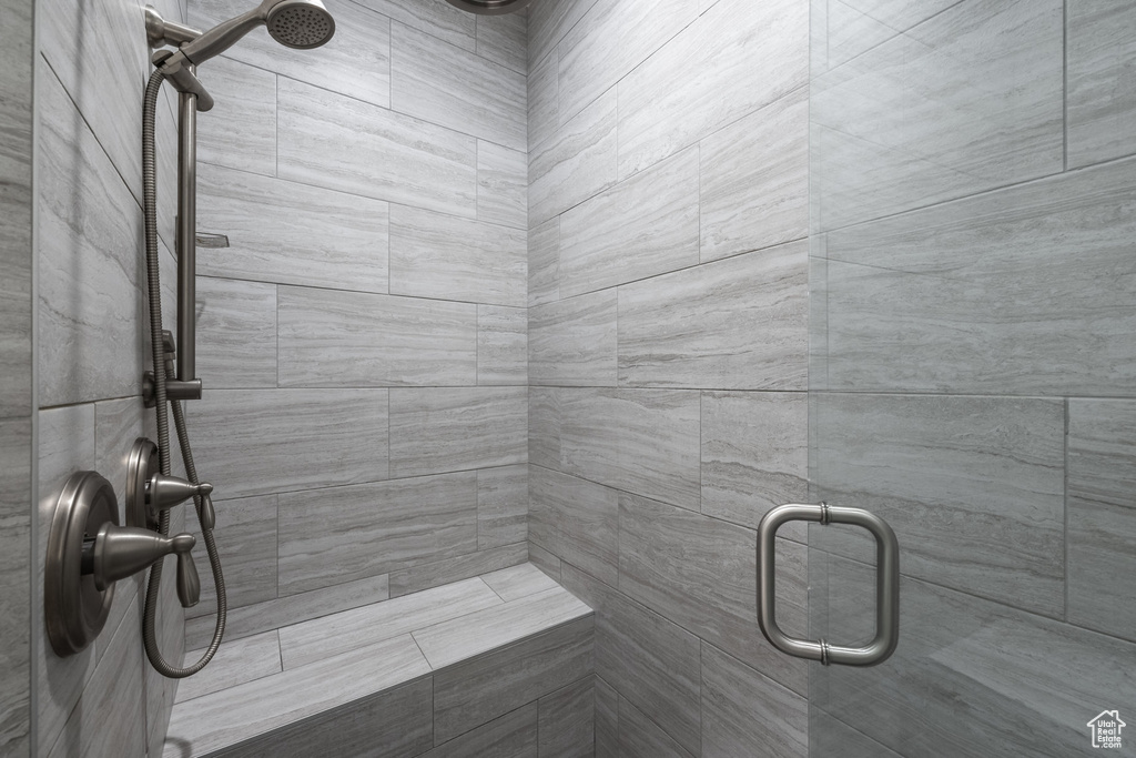 Full bathroom featuring a stall shower