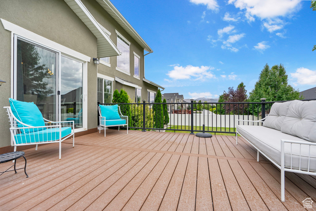 Wooden terrace with outdoor lounge area