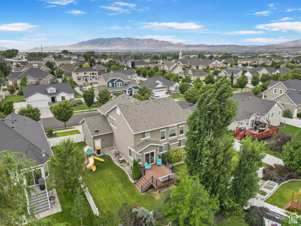 Aerial perspective of suburban area featuring mountains