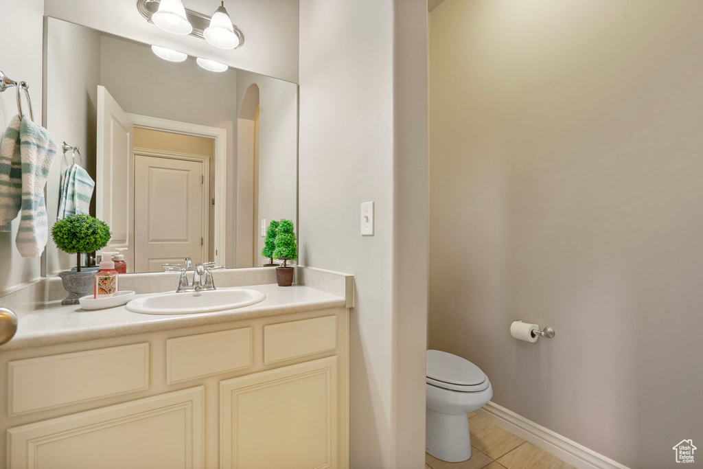 Bathroom featuring toilet and vanity