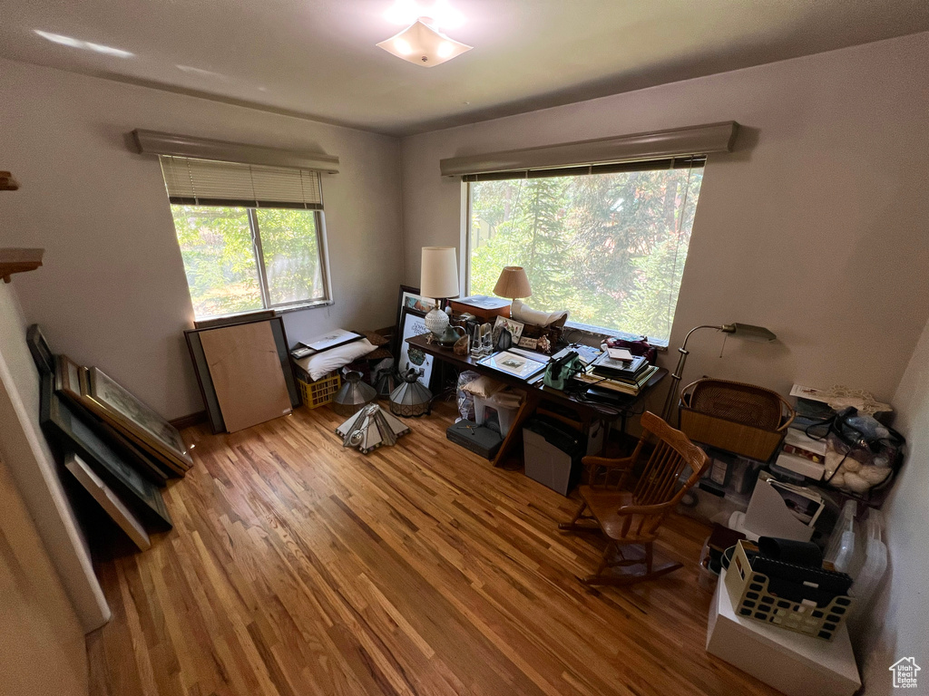 Office space with wood finished floors