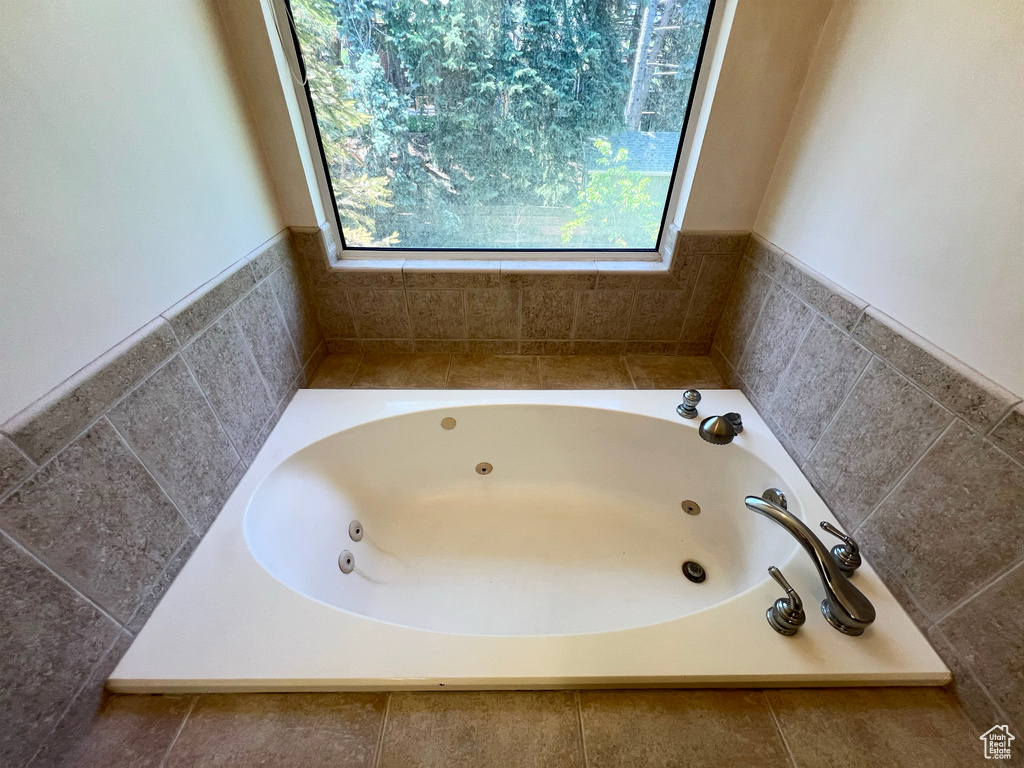 Bathroom with a jetted tub