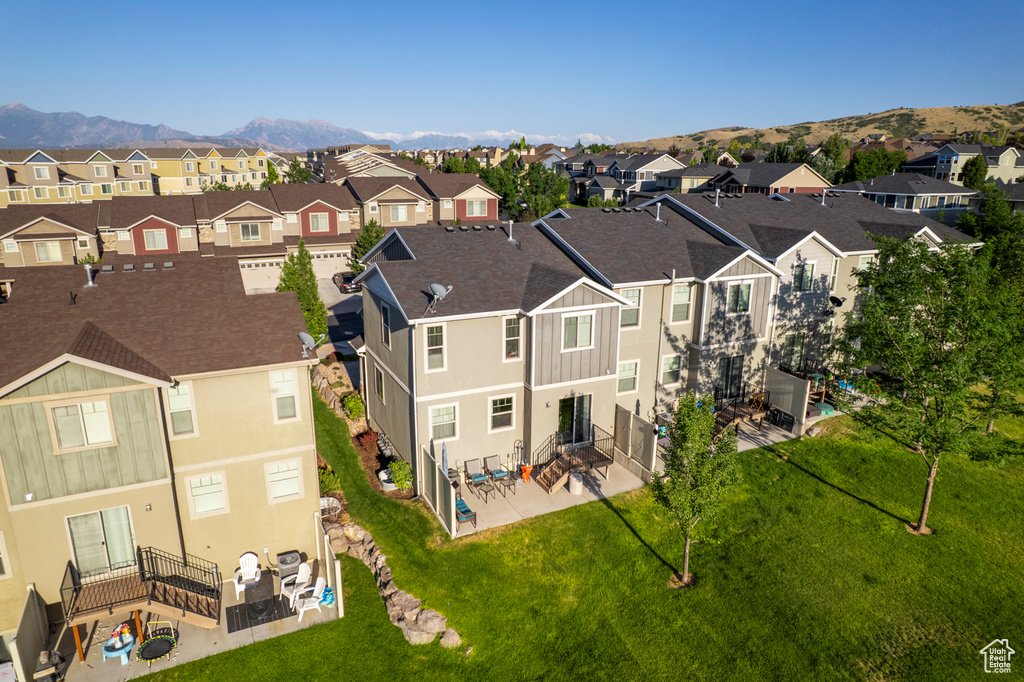 Aerial view of residential area with mountains