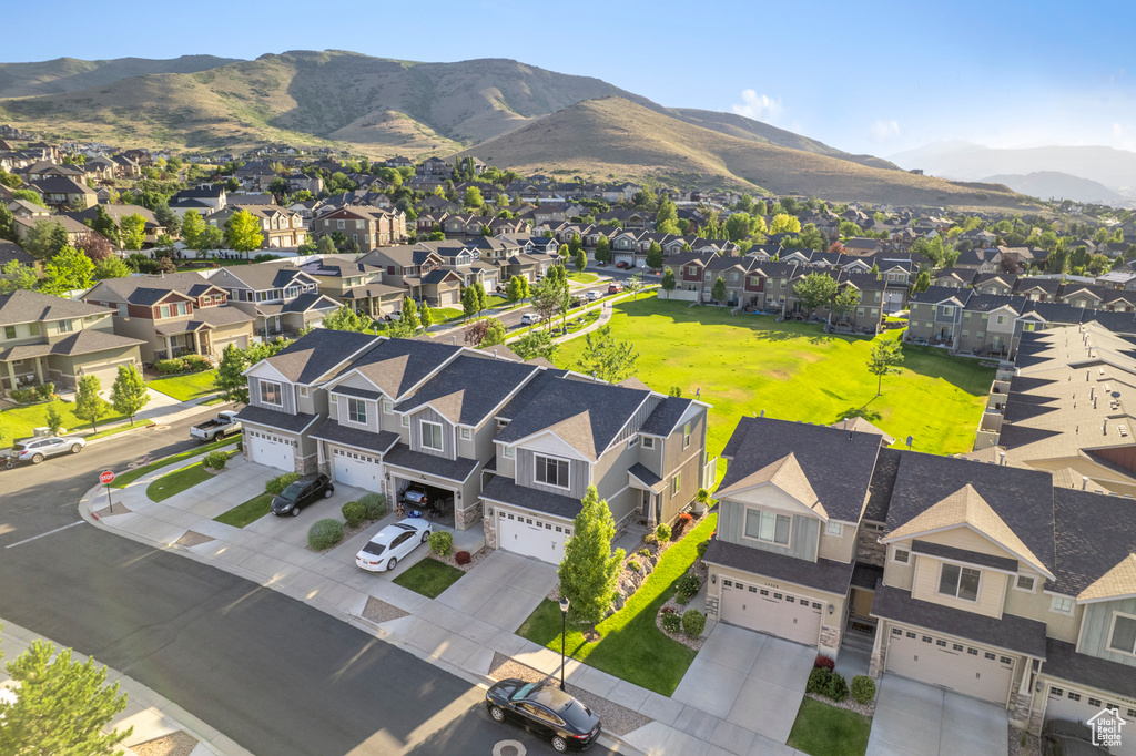 Aerial view of residential area with a mountain backdrop