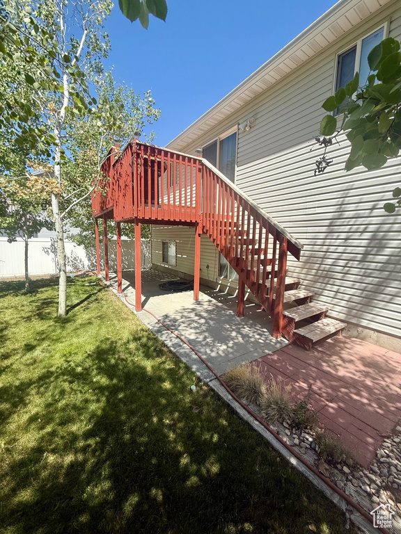 View of patio featuring a wooden deck