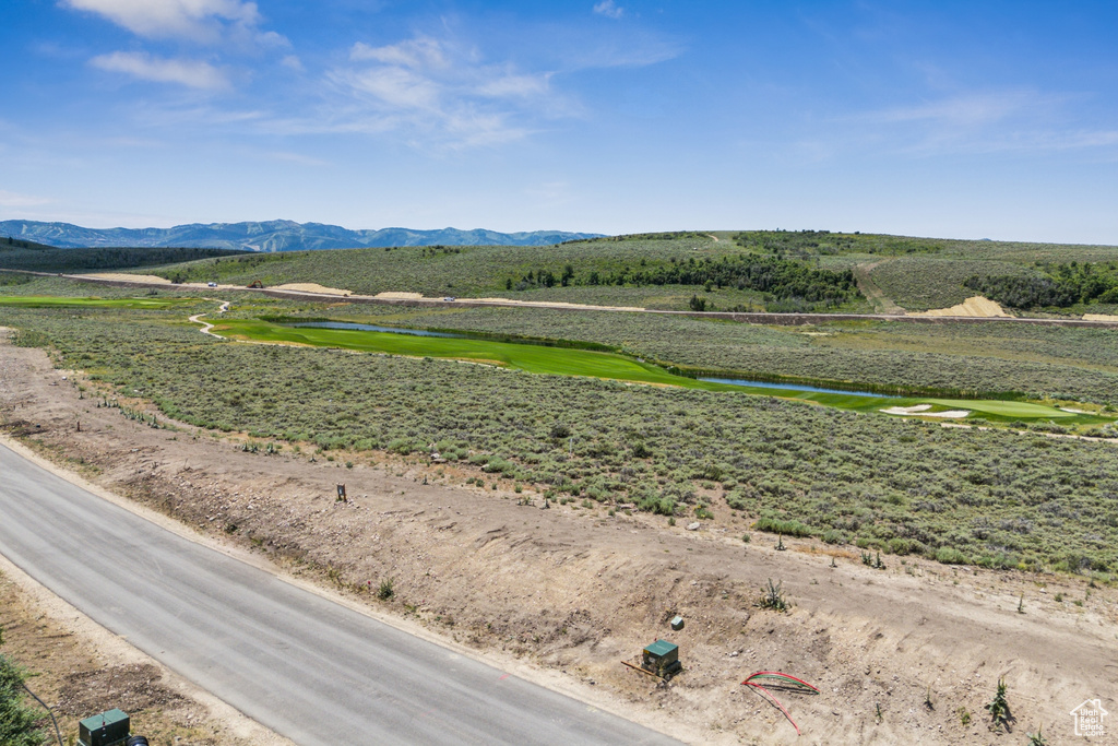 Mountain view with a large body of water and a local golf course