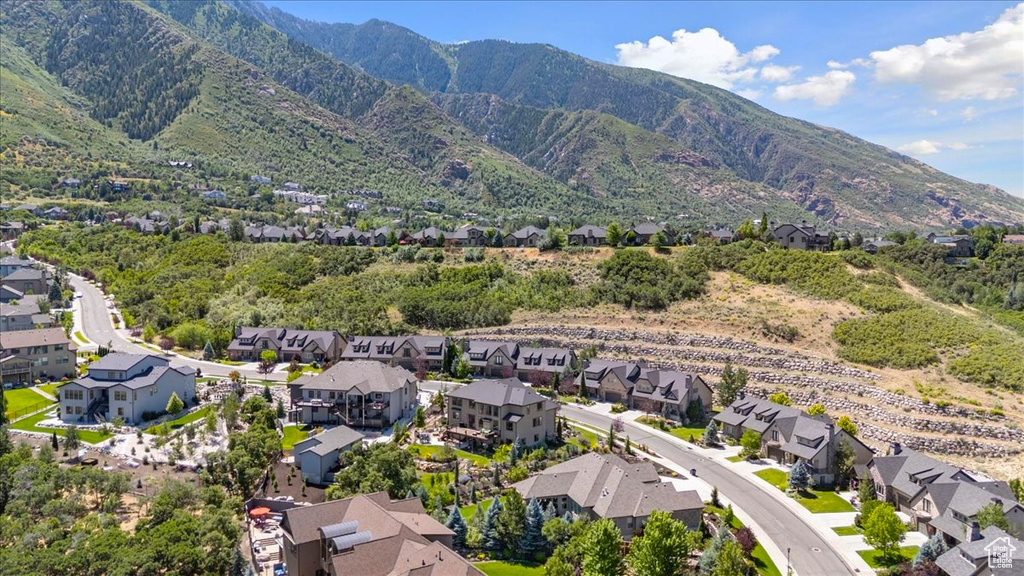 View of mountain backdrop with nearby suburban area