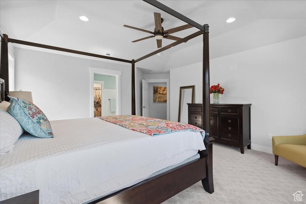 Carpeted bedroom featuring recessed lighting, ceiling fan, and lofted ceiling