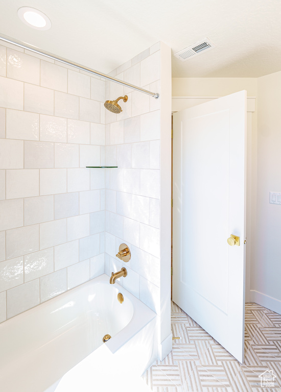 Full bathroom featuring washtub / shower combination