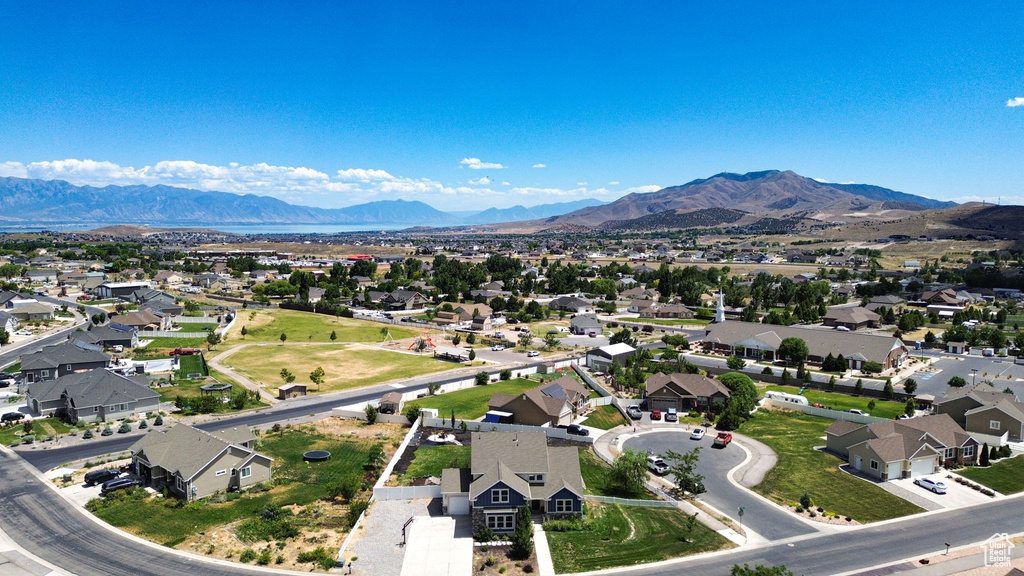 Aerial view of residential area with a mountain backdrop