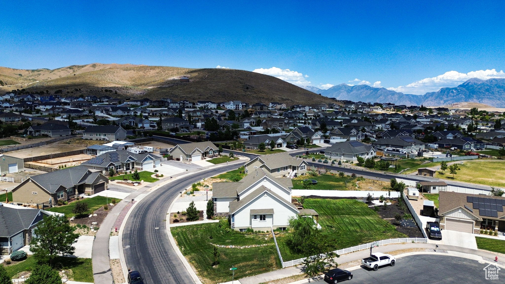 Aerial perspective of suburban area featuring mountains