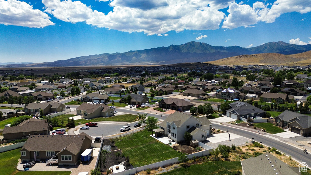 Aerial view of residential area with a mountain backdrop