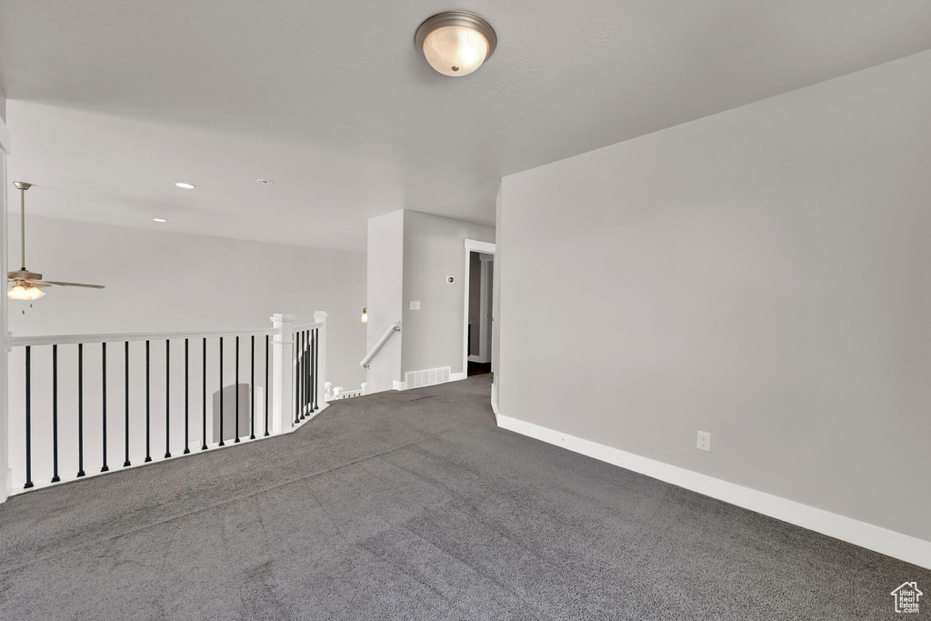 Unfurnished room featuring ceiling fan, carpet, and recessed lighting