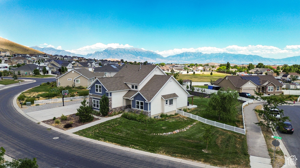 Aerial perspective of suburban area featuring mountains