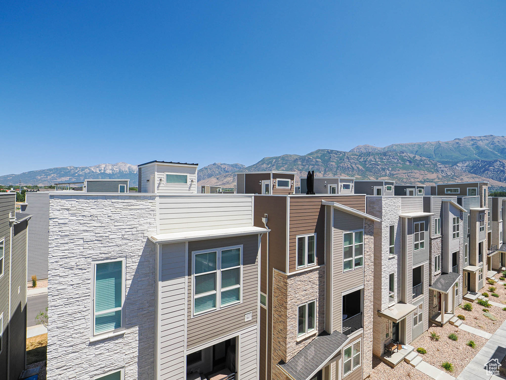 View of property with a mountain view