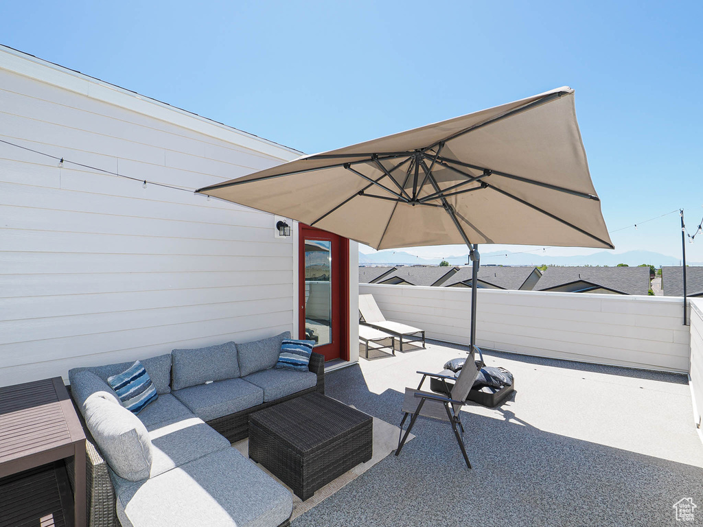Fenced backyard with a patio area and an outdoor hangout area