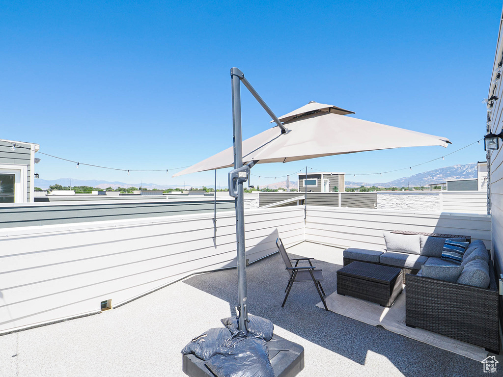 Patio / terrace featuring a mountain view