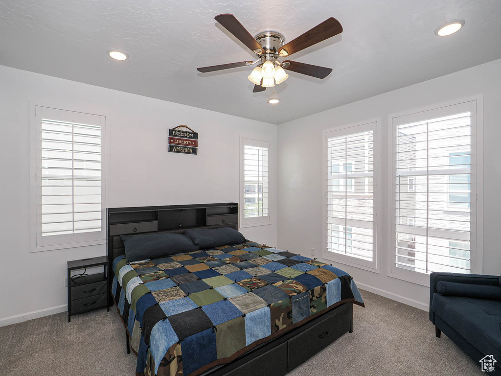 Bedroom with carpet flooring, recessed lighting, and a ceiling fan