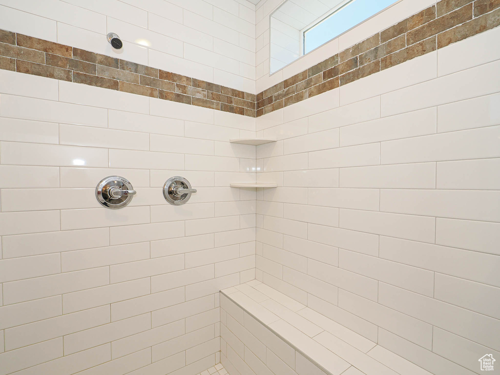 Bathroom with tiled shower