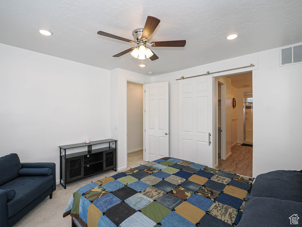 Bedroom featuring recessed lighting and a ceiling fan
