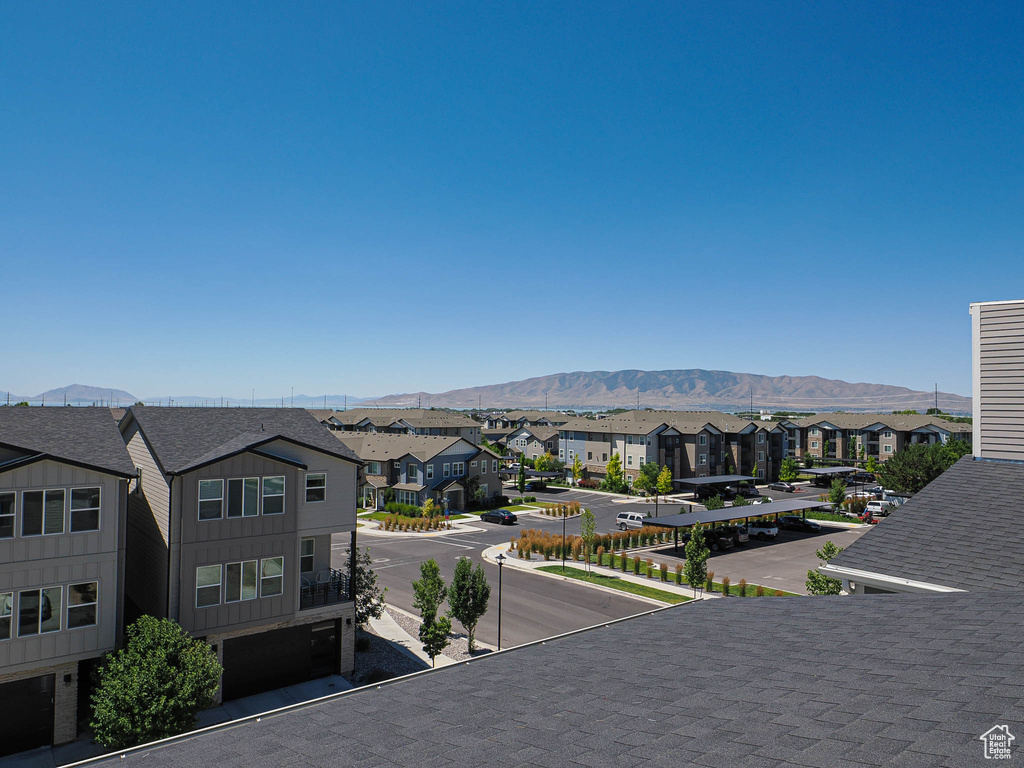 View of mountain backdrop with nearby suburban area