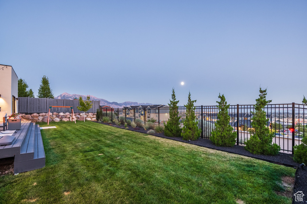 View of yard with a mountain view