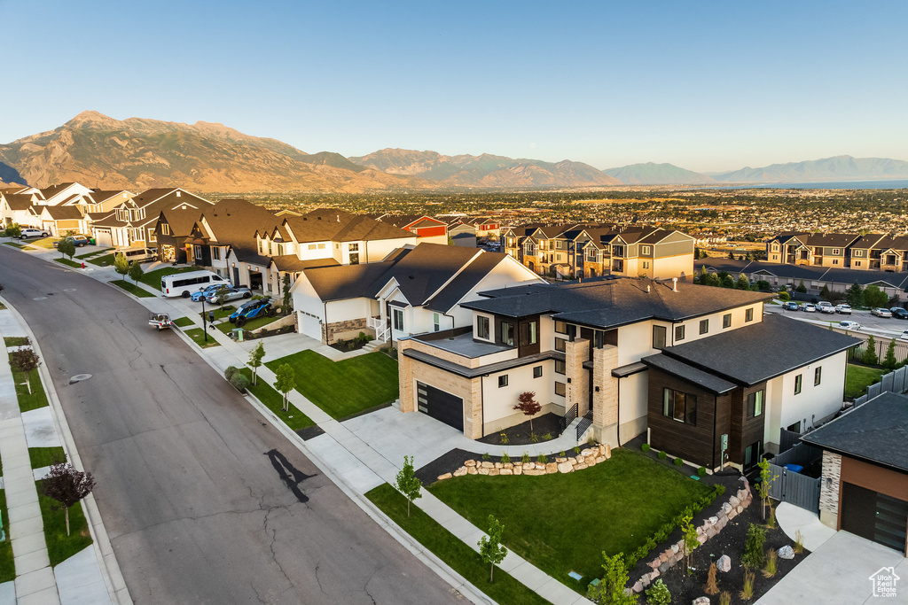 Aerial view of residential area with a mountain backdrop