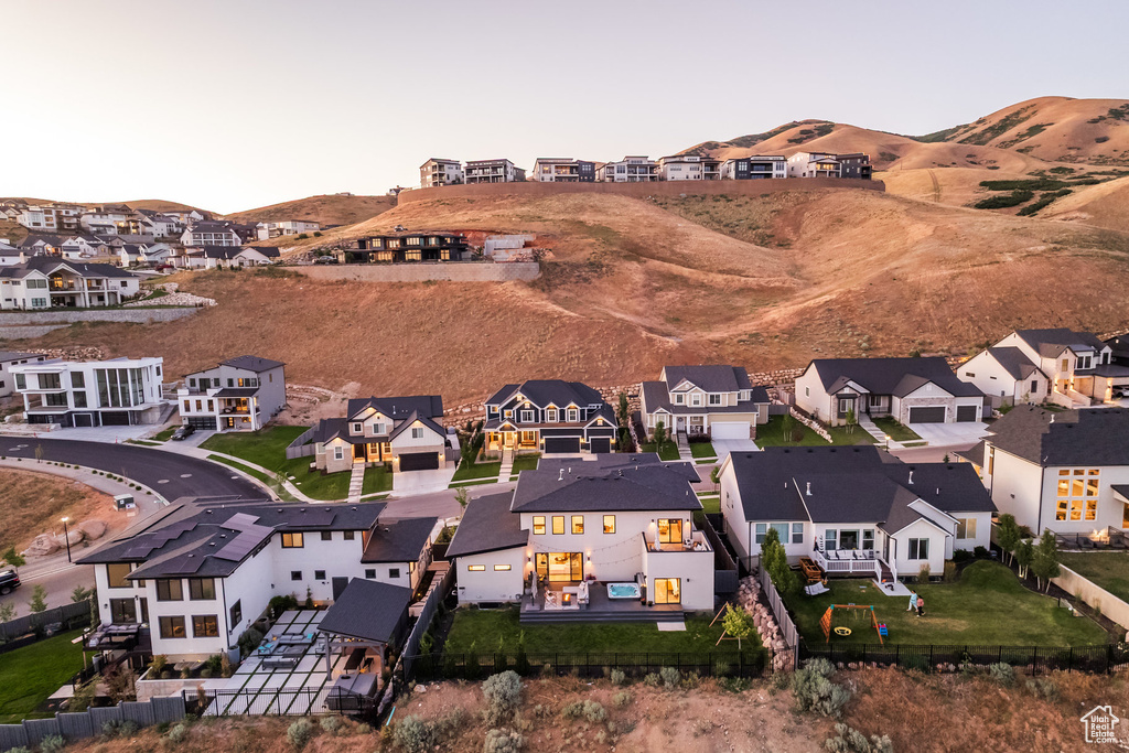 Aerial view of residential area with mountains