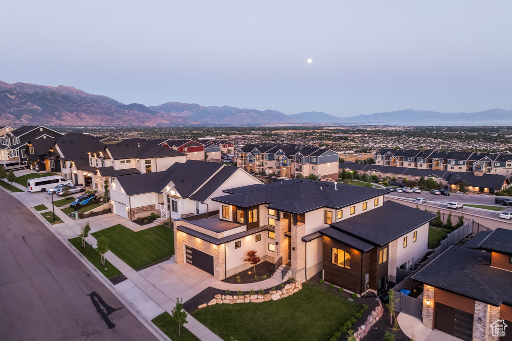 Aerial view of residential area with mountains
