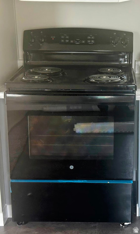 Kitchen view of black range with electric stovetop