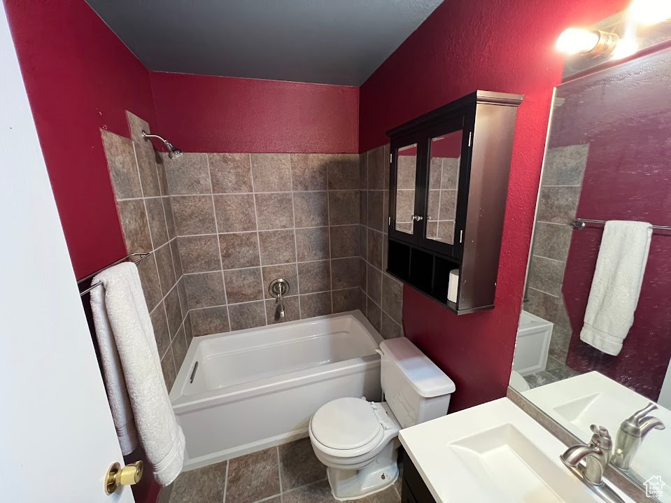 Full bathroom featuring vanity and toilet