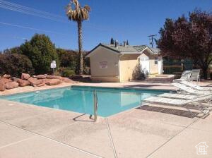 Community pool with a patio area