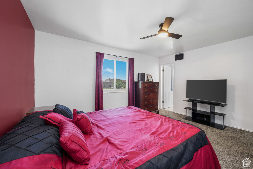 Bedroom featuring carpet flooring and ceiling fan