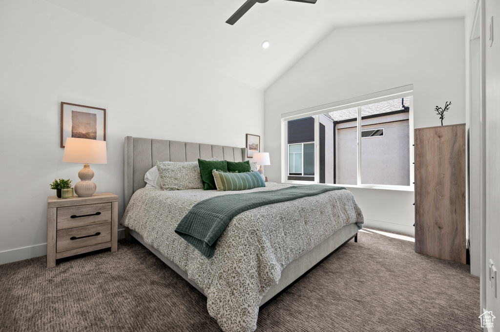 Bedroom with carpet, lofted ceiling, and ceiling fan