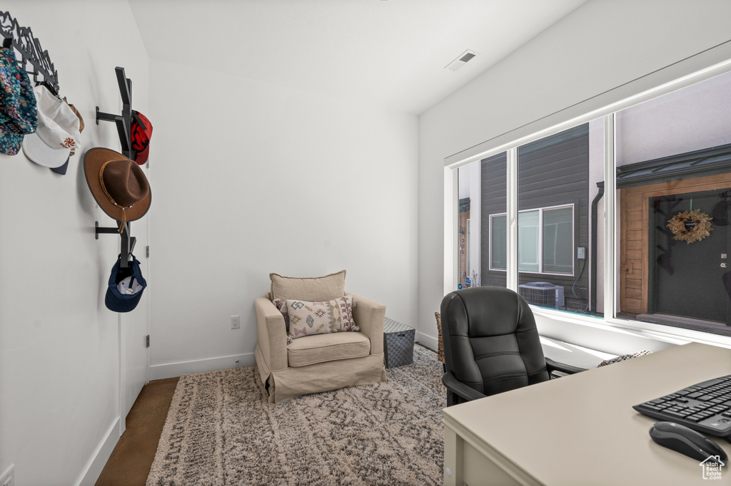 Office area featuring baseboards