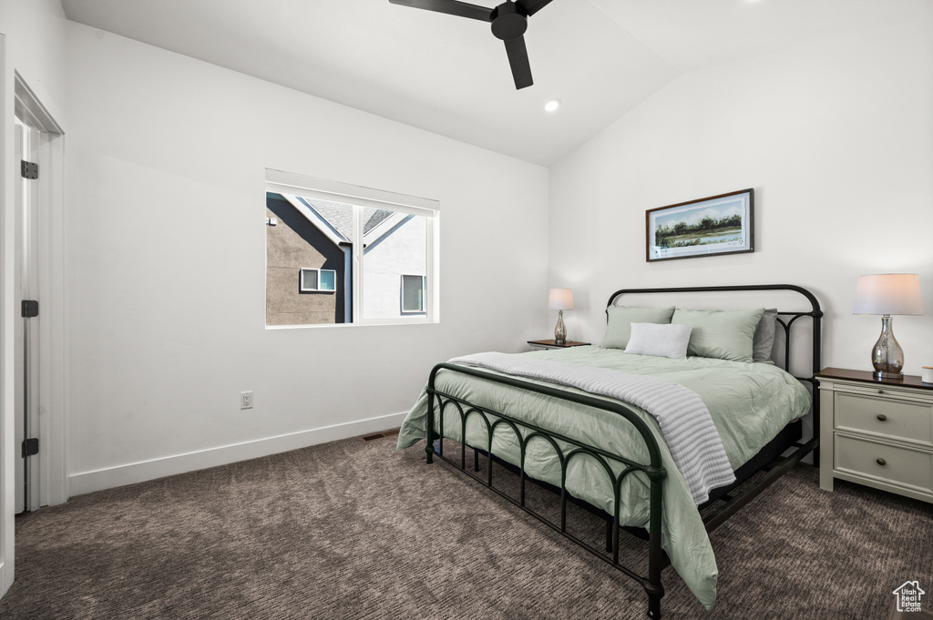 Carpeted bedroom featuring vaulted ceiling, recessed lighting, and ceiling fan