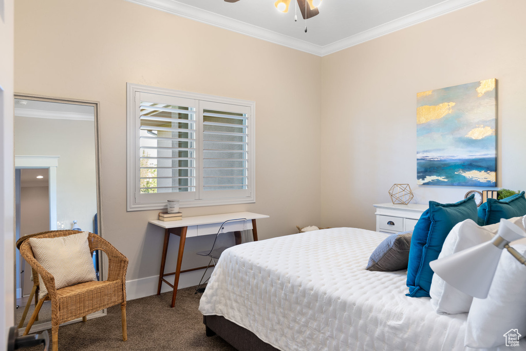 Bedroom featuring carpet floors and ornamental molding