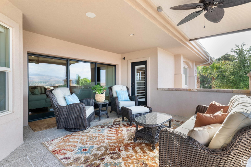 View of patio / terrace with ceiling fan and an outdoor hangout area
