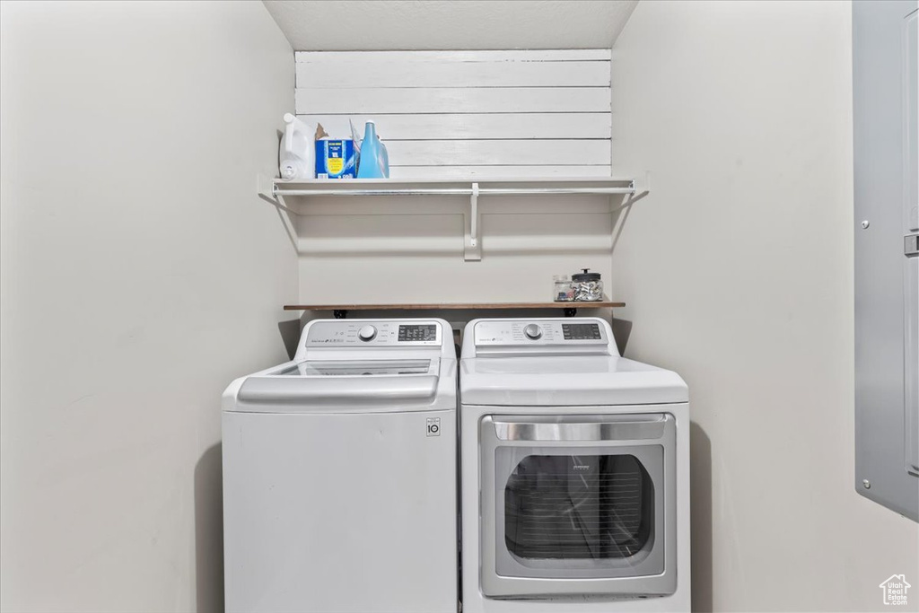 Washroom featuring separate washer and dryer